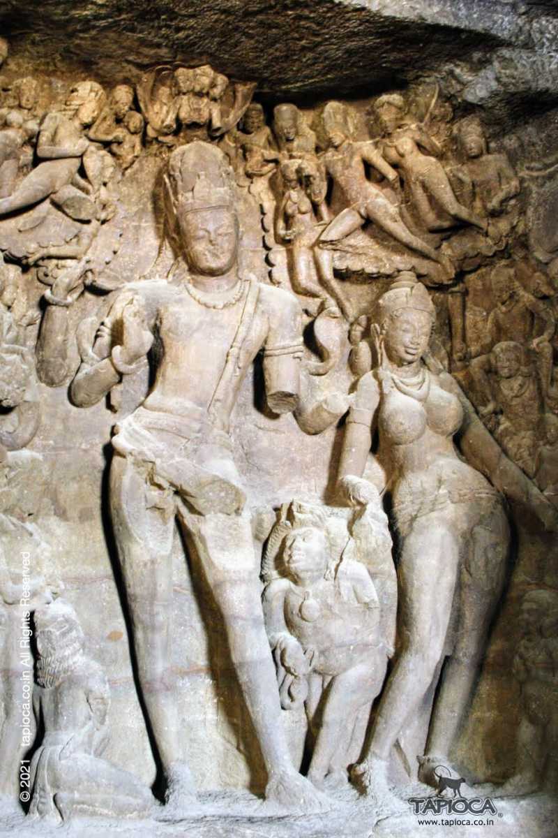 Shiva with his Consort Parvathi. This is the only panel in Elephanta Caves where the lower portions of the images are not damaged.