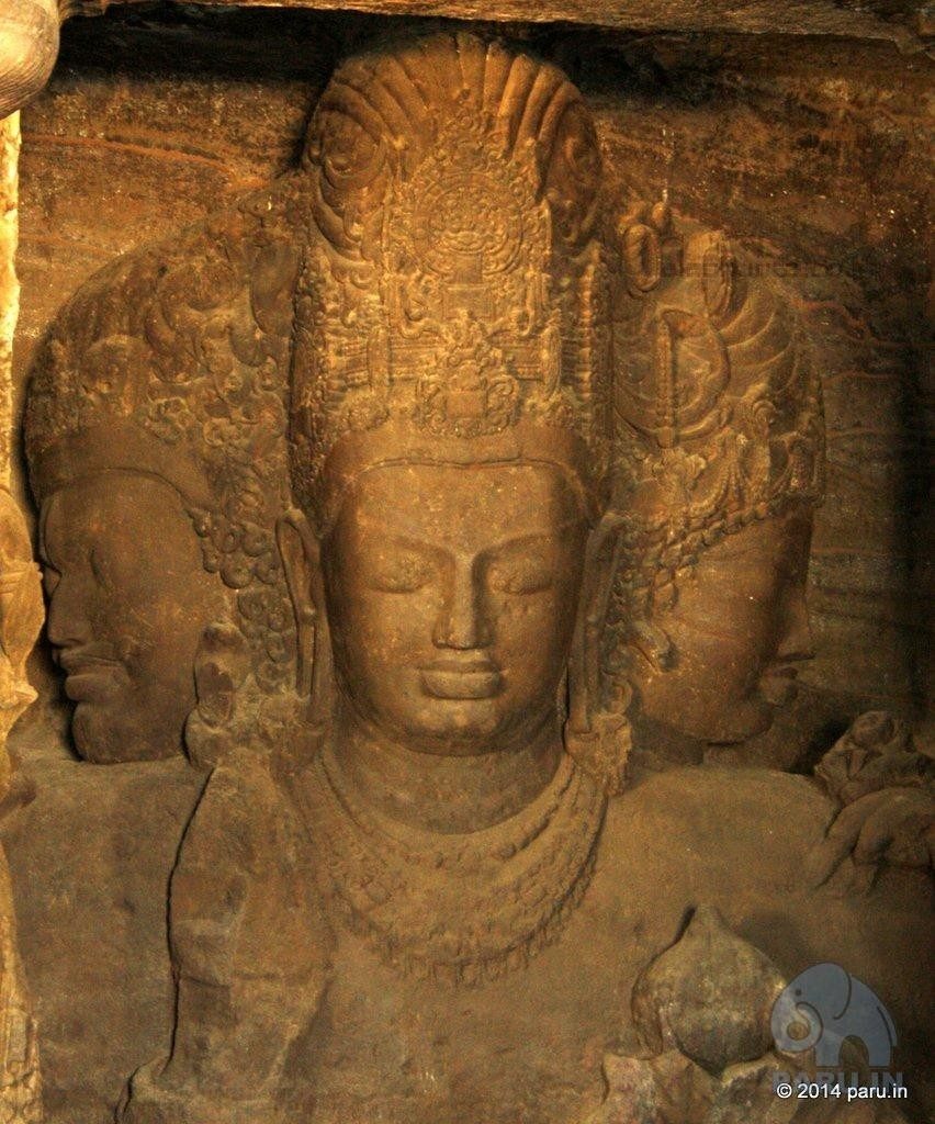 The center piece, the star attraction of Elephanta cave temple iconic image of the three headed Shiva called Mahesh , the great Lord.
